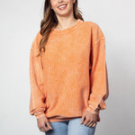 Unisex Orange Oversized Premium cotton corded fleece Sweatshirt with Super soft hand feel, vintage wash and ribbed crew neckline, cuffs, and hemline