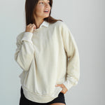 Women's Cream Relaxed Burnout fleece Sweatshirt with crew neck, dropped shoulders and hi-lo curved hem