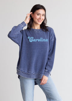 North Carolina Tar Heels Women's Ink Relaxed Burnout fleece Sweatshirt with crew neck, dropped shoulders and hi-lo curved hem