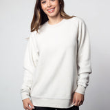 White womens crew sweatshirt with ribbed crew neck, raglan sleeves and hem.