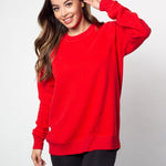 Red womens crew sweatshirt with ribbed crew neck, raglan sleeves and hem.