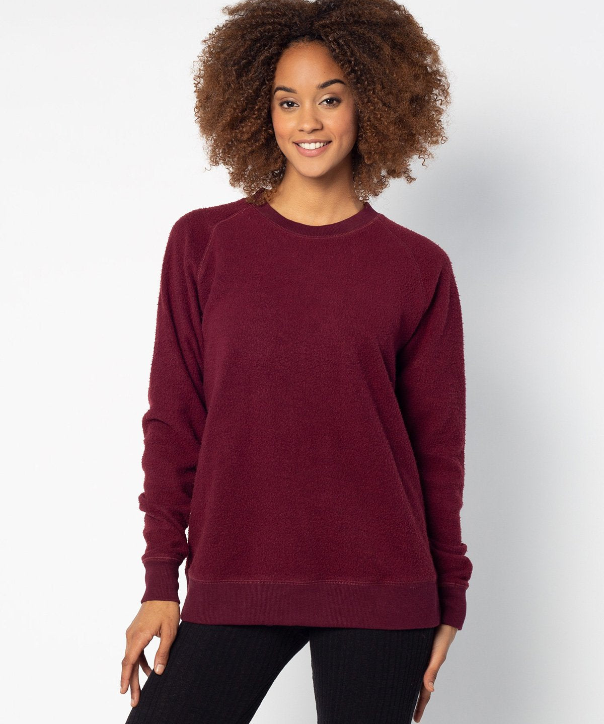 Maroon womens crew sweatshirt with ribbed crew neck, raglan sleeves and hem.