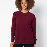 Maroon womens crew sweatshirt with ribbed crew neck, raglan sleeves and hem.
