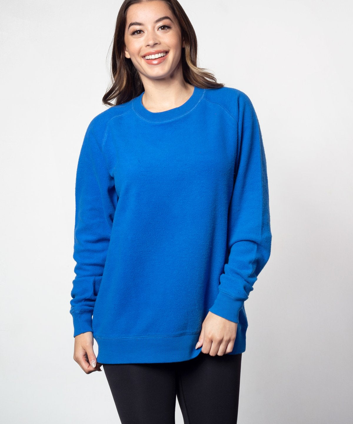 Royal blue womens crew sweatshirt with ribbed crew neck, raglan sleeves and hem.
