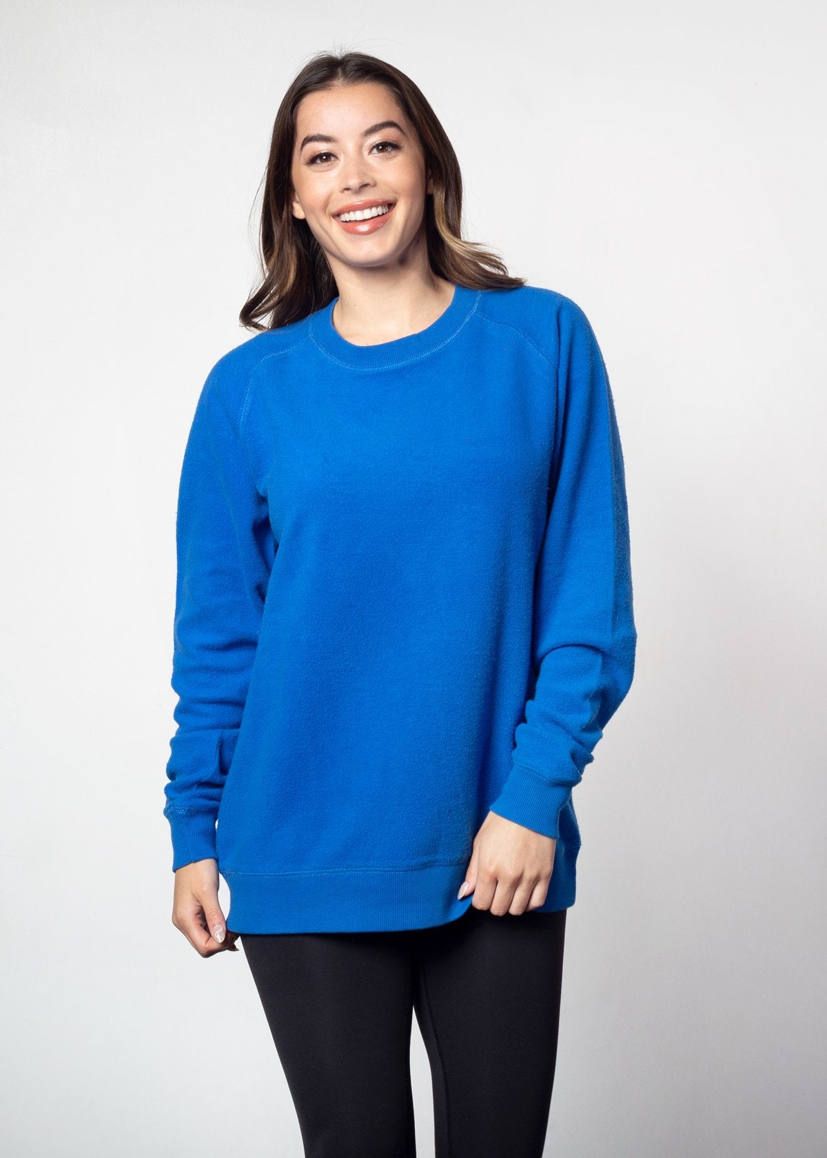 Royal blue womens crew sweatshirt with ribbed crew neck, raglan sleeves and hem.