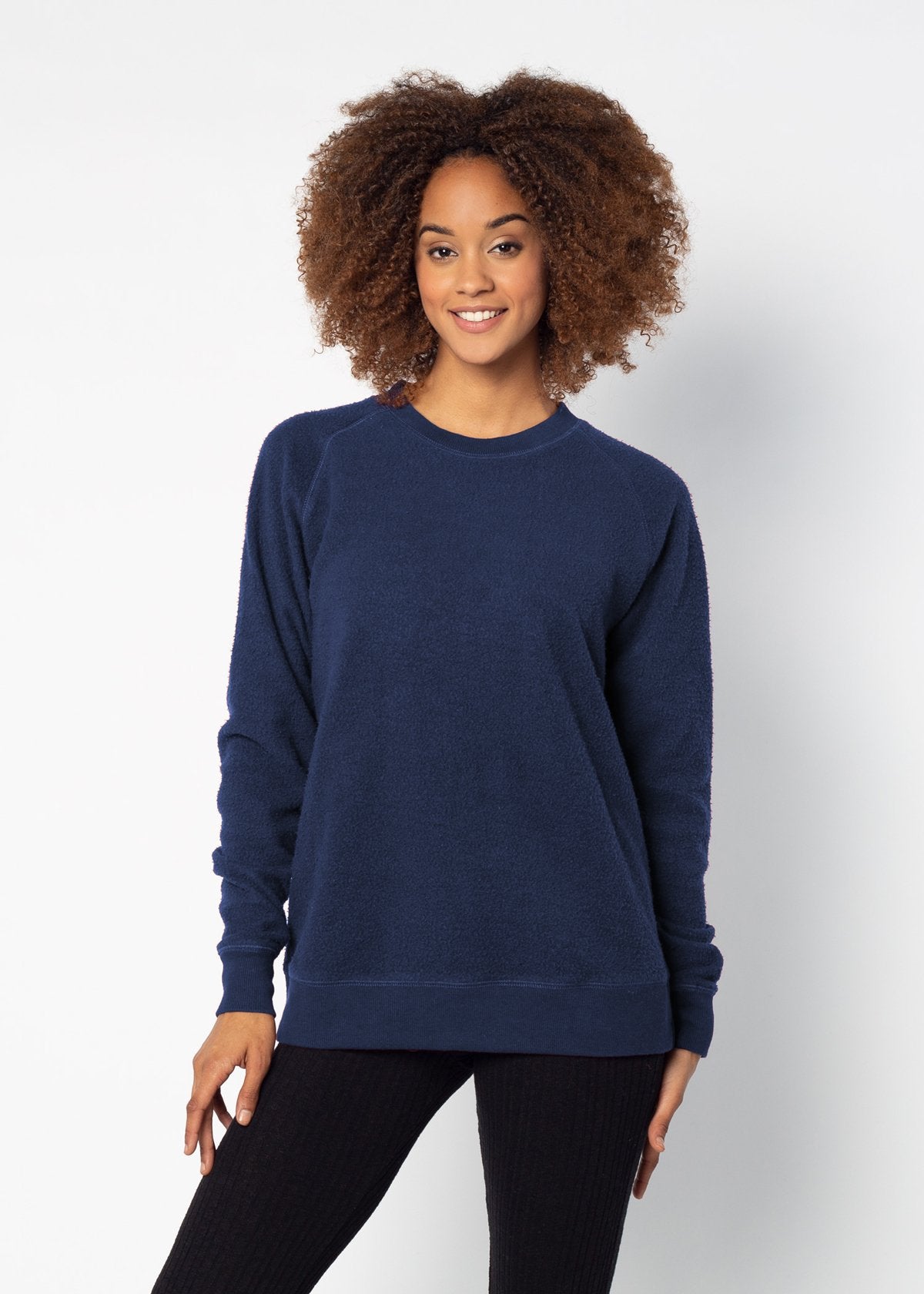 Navy womens crew sweatshirt with ribbed crew neck, raglan sleeves and hem.