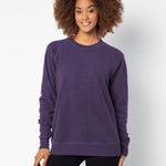 Purple womens crew sweatshirt with ribbed crew neck, raglan sleeves and hem.