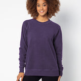 Purple womens crew sweatshirt with ribbed crew neck, raglan sleeves and hem.